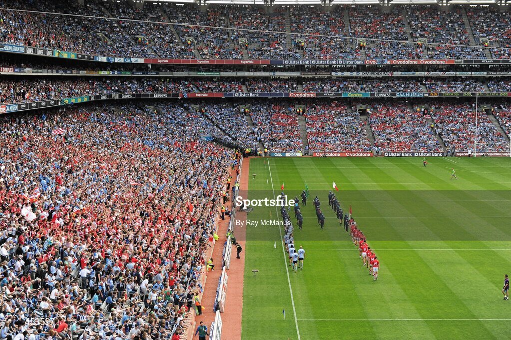 22 August 2010; The Cork and Dublin players march behind the St Michael Scout Band, Enniskillen, before the game. GAA Football All-Ireland Senior Championship Semi-Final, Dublin v Cork, Croke Park, Dublin. Picture credit: Ray McManus / SPORTSFILE