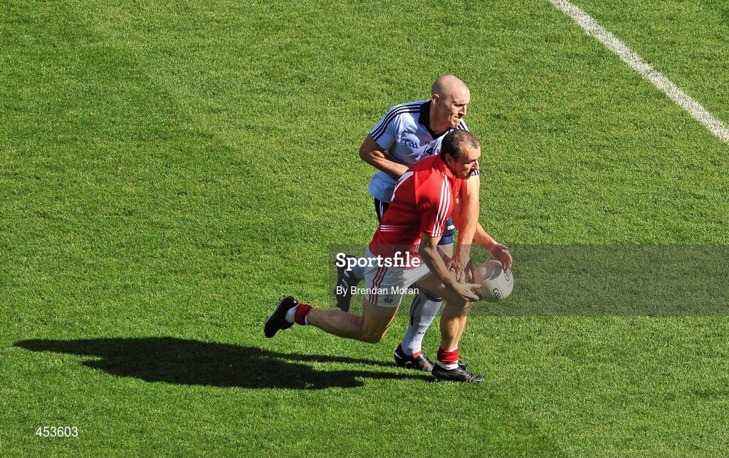 22 August 2010; Eoghan O'Gara, Dublin, dispossesses John Miskella, Cork. GAA Football All-Ireland Senior Championship Semi-Final, Dublin v Cork, Croke Park, Dublin. Picture credit: Brendan Moran / SPORTSFILE