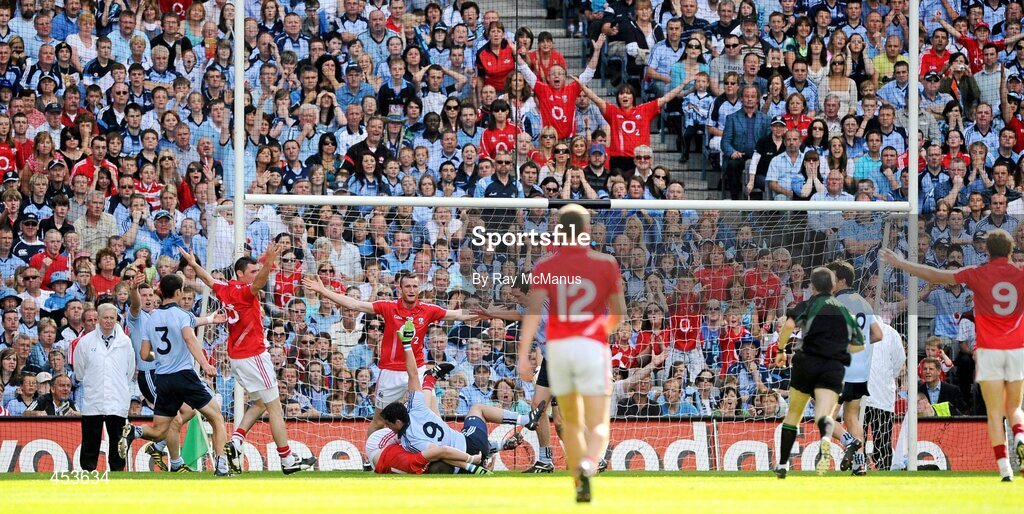 22 August 2010; Ross O'Connell, Dublin, stops Colm O'Neill, Cork, and concedes a penalty. GAA Football All-Ireland Senior Championship Semi-Final, Dublin v Cork, Croke Park, Dublin. Picture credit: Ray McManus / SPORTSFILE