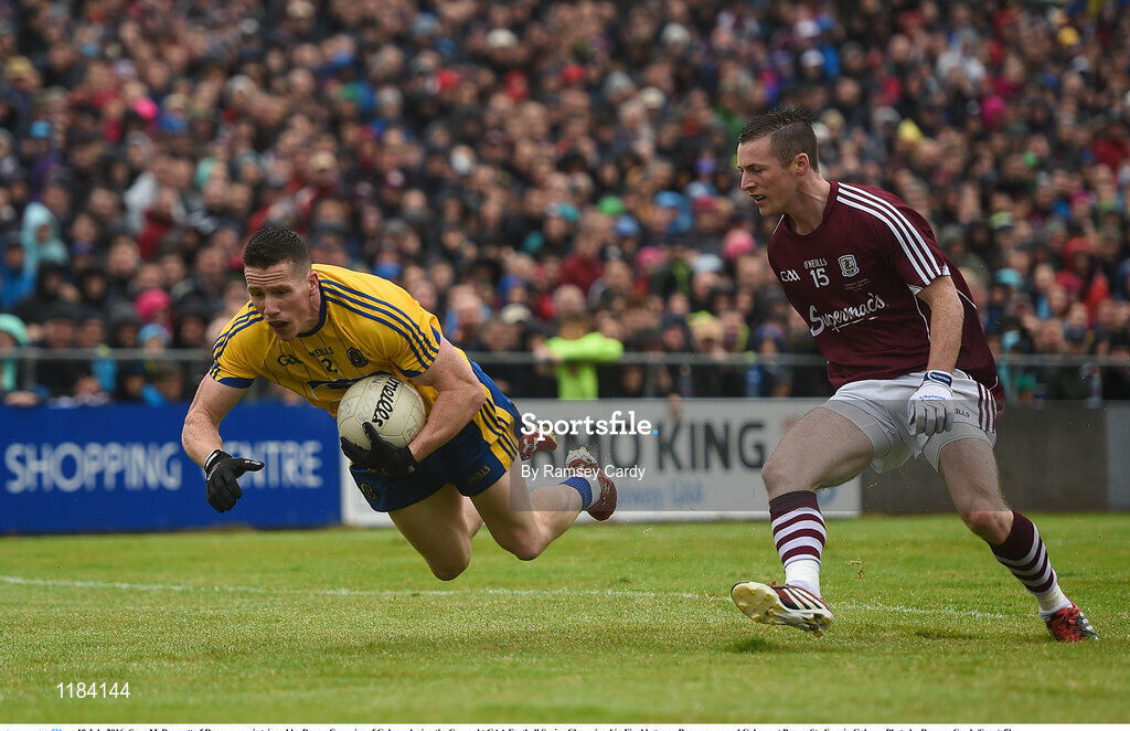 10 July 2016; Sean McDermott of Roscommon is tripped by Danny Cummins of Galway during the Connacht GAA Football Senior Championship Final between Roscommon and Galway at Pearse Stadium in Galway. Photo by Ramsey Cardy/Sportsfile