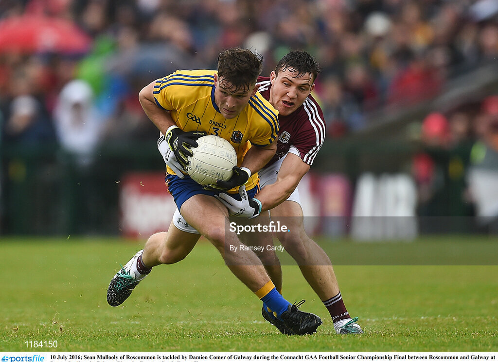 10 July 2016; Sean Mullooly of Roscommon is tackled by Damien Comer of Galway during the Connacht GAA Football Senior Championship Final between Roscommon and Galway at Pearse Stadium in Galway. Photo by Ramsey Cardy/Sportsfile