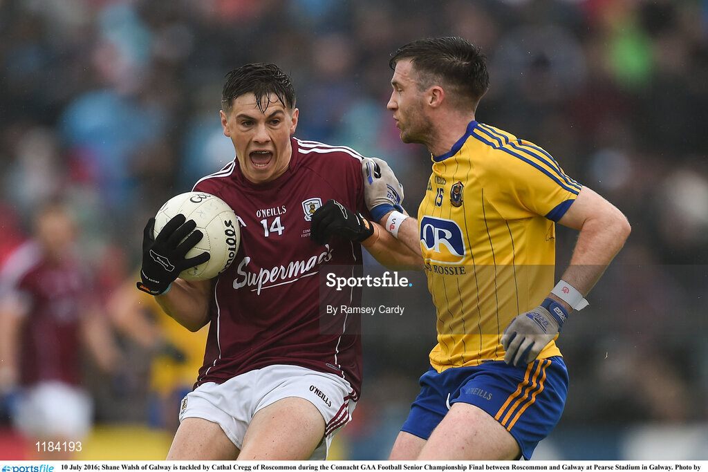 10 July 2016; Shane Walsh of Galway is tackled by Cathal Cregg of Roscommon during the Connacht GAA Football Senior Championship Final between Roscommon and Galway at Pearse Stadium in Galway. Photo by Ramsey Cardy/Sportsfile