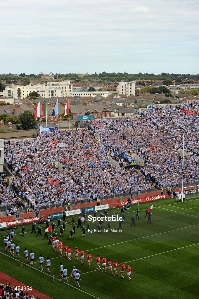 22 August 2010; The Cork and Dublin teams march behind the St Michael's Scout Band, Enniskillen, during the pre-match parade before the game. GAA Football All-Ireland Senior Championship Semi-Final, Dublin v Cork, Croke Park, Dublin. Picture credit: Brendan Moran / SPORTSFILE