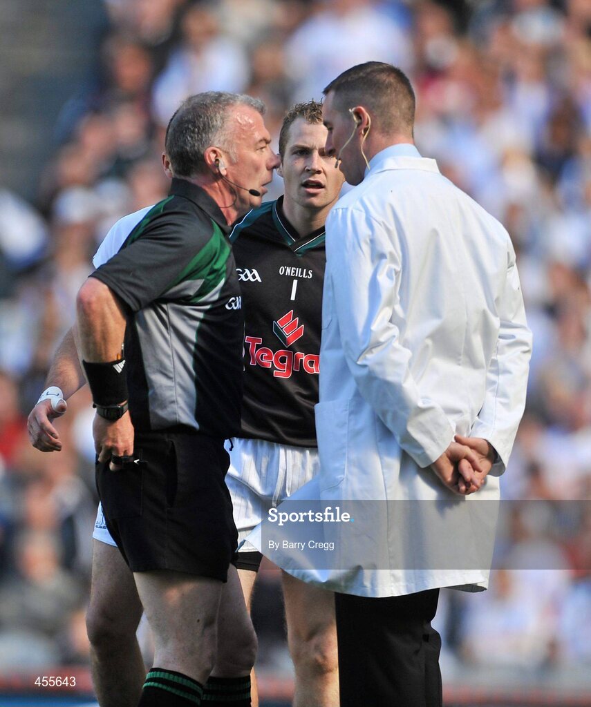 29 August 2010; Referee Pat McEnaney clarifies with his umpire that the Down goal was legitimate despite protests from Kildare goalkeeper Shane McCormack. GAA Football All-Ireland Senior Championship Semi-Final, Kildare v Down, Croke Park, Dublin. Picture credit: Barry Cregg / SPORTSFILE