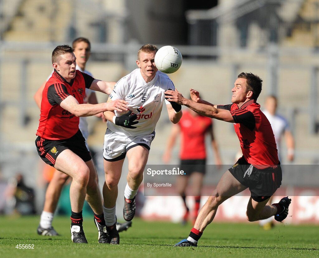 29 August 2010; Morgan O'Flaherty, Kildare, in action against Kalum King, left, and Mark Poland, Down. GAA Football All-Ireland Senior Championship Semi-Final, Kildare v Down, Croke Park, Dublin. Photo by Sportsfile