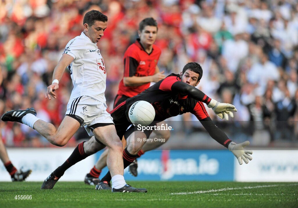29 August 2010; Eamonn Callaghan, Kildare, shoots to score his side's first goal, despite the efforts of Brendan McVeigh, Down. GAA Football All-Ireland Senior Championship Semi-Final, Kildare v Down, Croke Park, Dublin. Picture credit: Barry Cregg / SPORTSFILE