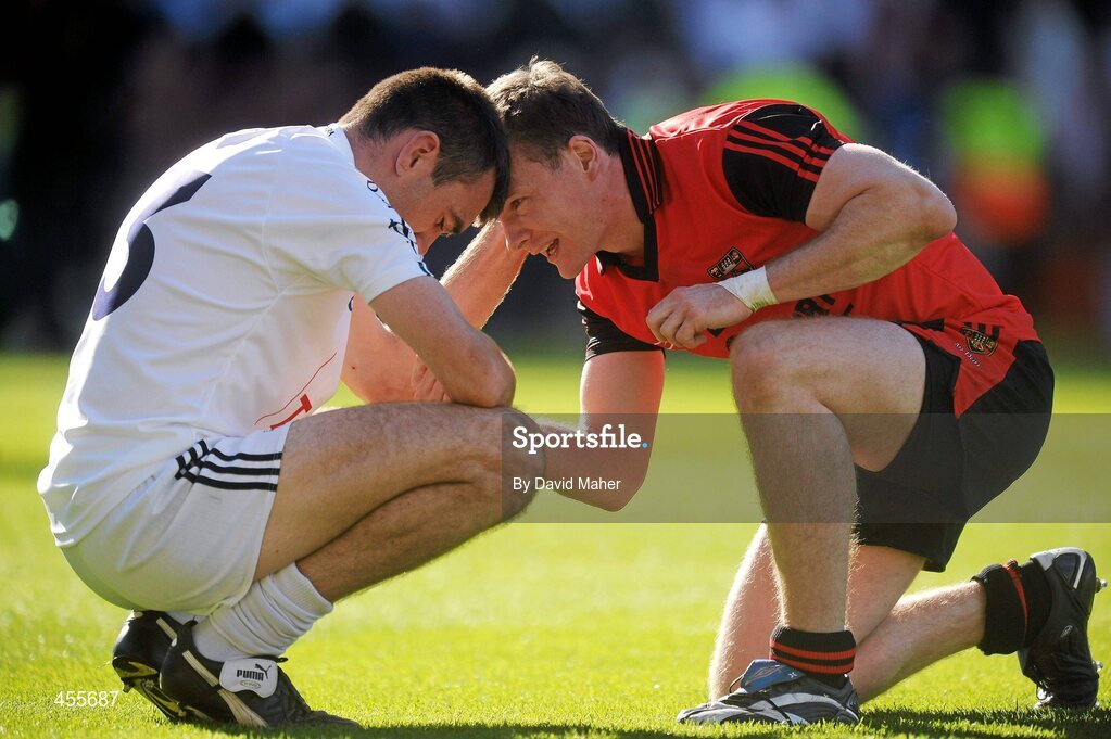 29 August 2010; A disappointed Kildare captain John Doyle is consoled by Daniel McCartan, Down, at the end of the game. GAA Football All-Ireland Senior Championship Semi-Final, Kildare v Down, Croke Park, Dublin. Picture credit: David Maher / SPORTSFILE