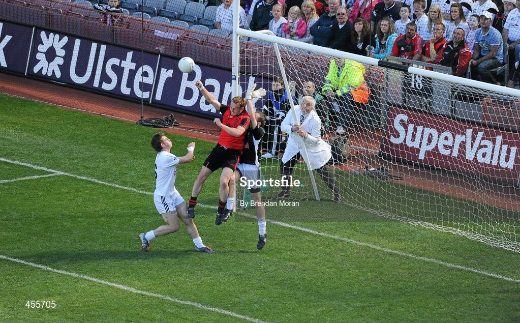 29 August 2010; Down's Benny Coulter punches the ball past Kildare's Emmet Bolton and goalkeeper Shane McCormack into the net for his side's goal in the first half. GAA Football All-Ireland Senior Championship Semi-Final, Kildare v Down, Croke Park, Dublin. Picture credit: Brendan Moran / SPORTSFILE