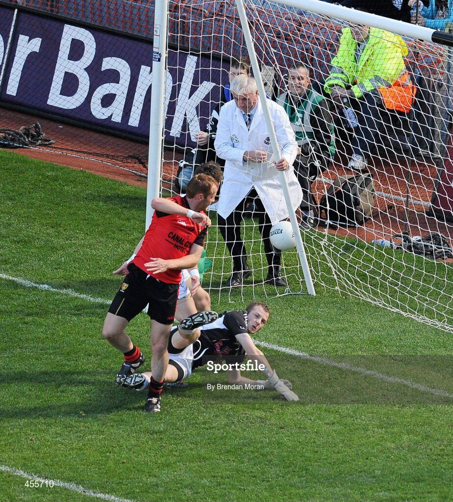 29 August 2010; Down's Benny Coulter punches the ball past Kildare's Emmet Bolton and goalkeeper Shane McCormack into the net for his side's goal in the first half. GAA Football All-Ireland Senior Championship Semi-Final, Kildare v Down, Croke Park, Dublin. Picture credit: Brendan Moran / SPORTSFILE