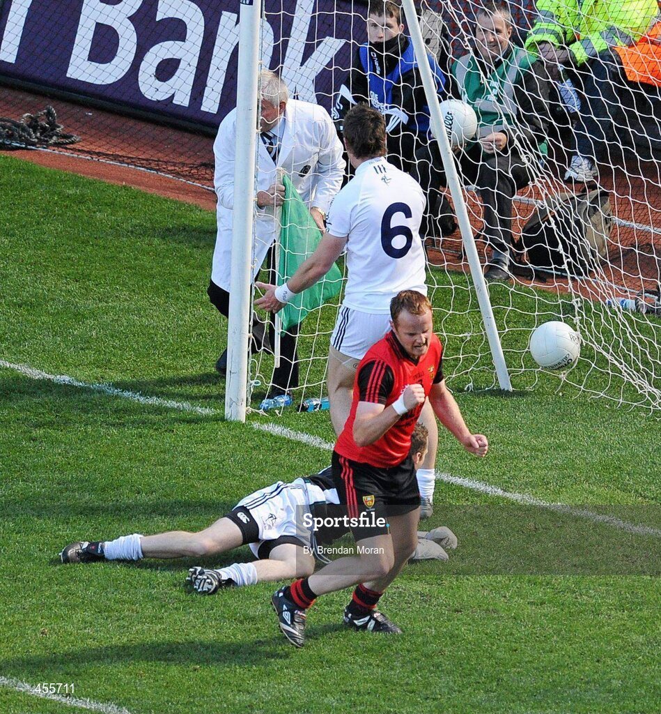 29 August 2010; Down's Benny Coulter celebrates scoring his side's goal as Kildare's Emmet Bolton appeals to the umpire. GAA Football All-Ireland Senior Championship Semi-Final, Kildare v Down, Croke Park, Dublin. Picture credit: Brendan Moran / SPORTSFILE
