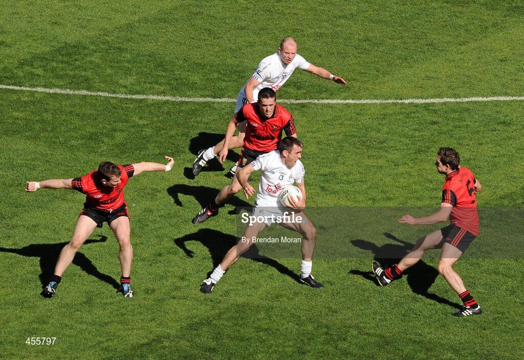 29 August 2010; John Doyle, Kildare, in action against Daniel McCartan, left, Conor Garvey, centre, and Declan Rooney, Down. GAA Football All-Ireland Senior Championship Semi-Final, Kildare v Down, Croke Park, Dublin. Picture credit: Brendan Moran / SPORTSFILE