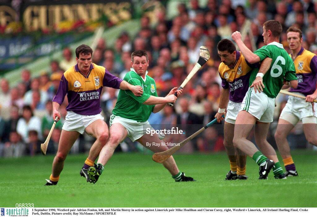 1 Septmber 1996; Wexford pair Adrian Fenlon, left, and Martin Storey in action against Limerick pair Mike Houlihan and Ciaran Carey, right, Wexford v Limerick, All Ireland Hurling Final, Croke Park, Dublin. Picture credit; Ray McManus / SPORTSFILE
