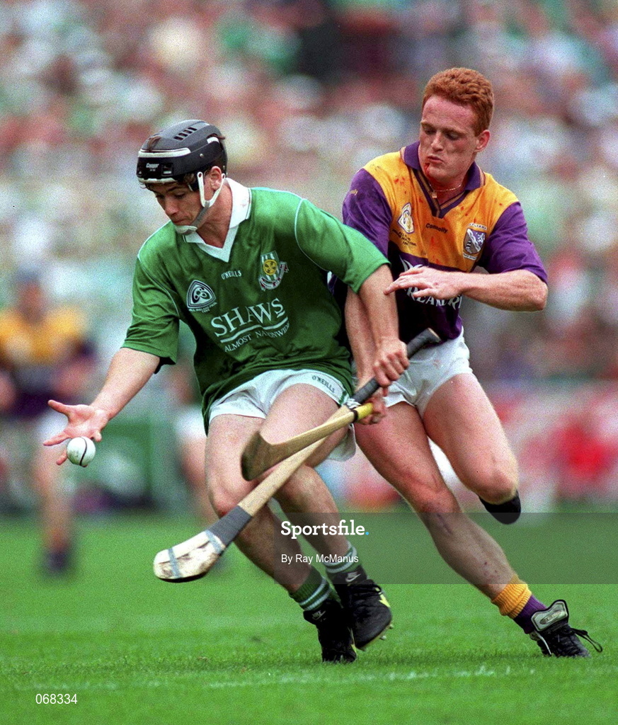 1 September 1996; Barry Foley of Limerick in action against Rod Guiney of Wexford during the Guinness All-Ireland Senior Hurling Championship Final match between Wexford and Limerick at Croke Park in Dublin. Photo by Ray McManus/Sportsfile