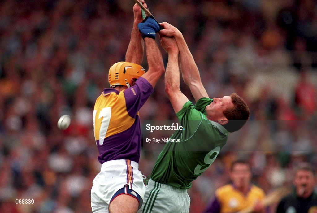 1 September 1996; Sean O'Neill of Limerick in action against George O'Connor of Wexford during the Guinness All-Ireland Senior Hurling Championship Final match between Wexford and Limerick at Croke Park in Dublin. Photo by Ray McManus/Sportsfile
