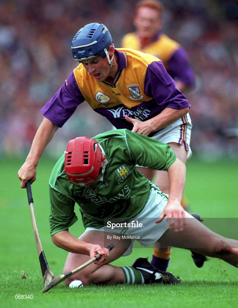 1 September 1996; TJ Ryan of Limerick in action against Colm Kehoe of Wexford during the Guinness All-Ireland Senior Hurling Championship Final match between Wexford and Limerick at Croke Park in Dublin. Photo by Ray McManus/Sportsfile