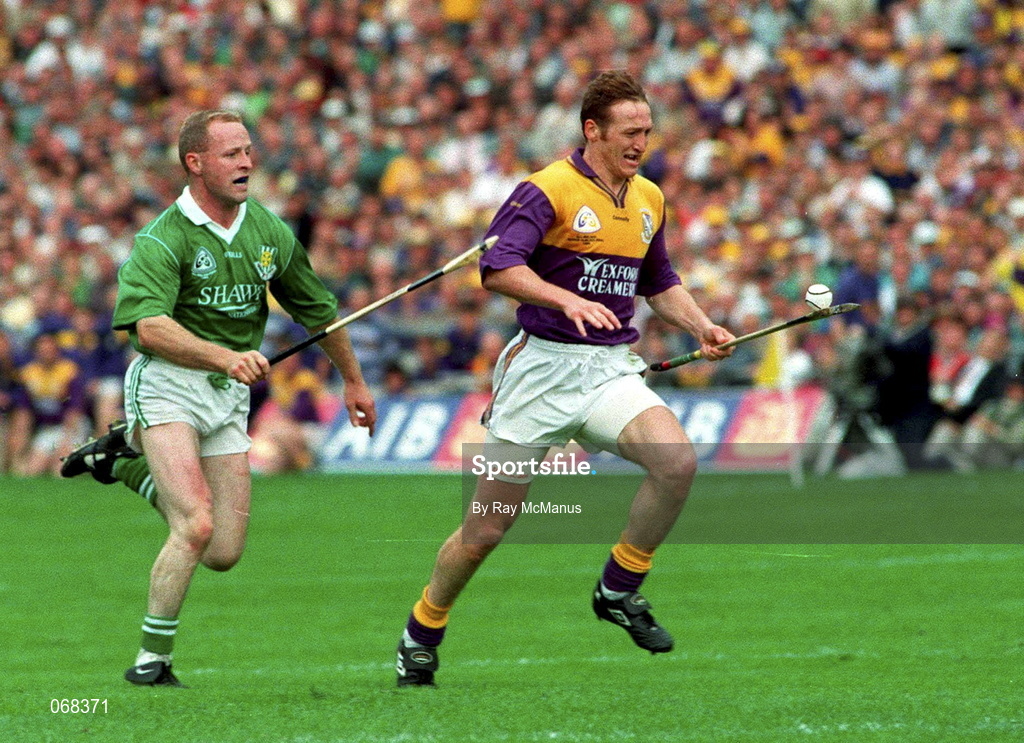 1 September 1996; Larry Murphy of Wexford in action against Stephen McDonagh of Limerick during the Guinness All-Ireland Senior Hurling Championship Final match between Wexford and Limerick at Croke Park in Dublin. Photo by Ray McManus/Sportsfile