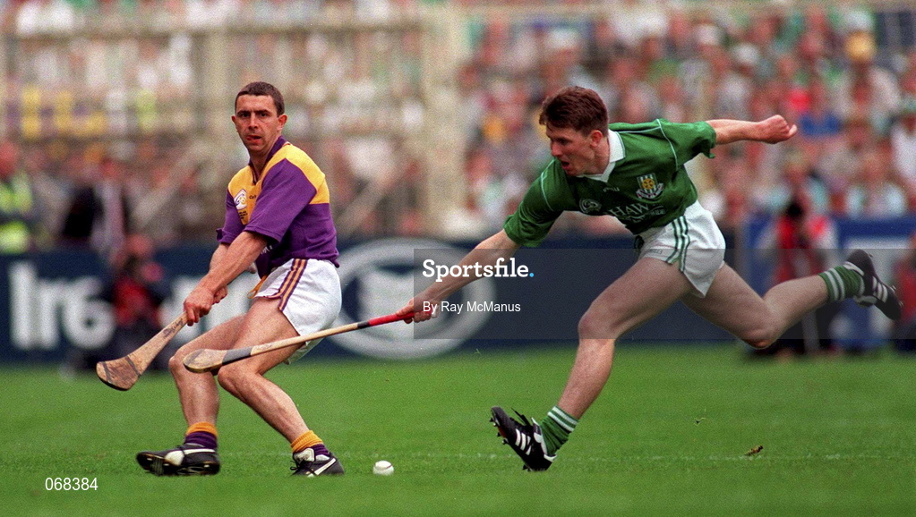 1 September 1996; Larry O'Gorman of Wexford in action against Mark Foley of Limerick during the Guinness All-Ireland Senior Hurling Championship Final match between Wexford and Limerick at Croke Park in Dublin. Photo by Ray McManus/Sportsfile