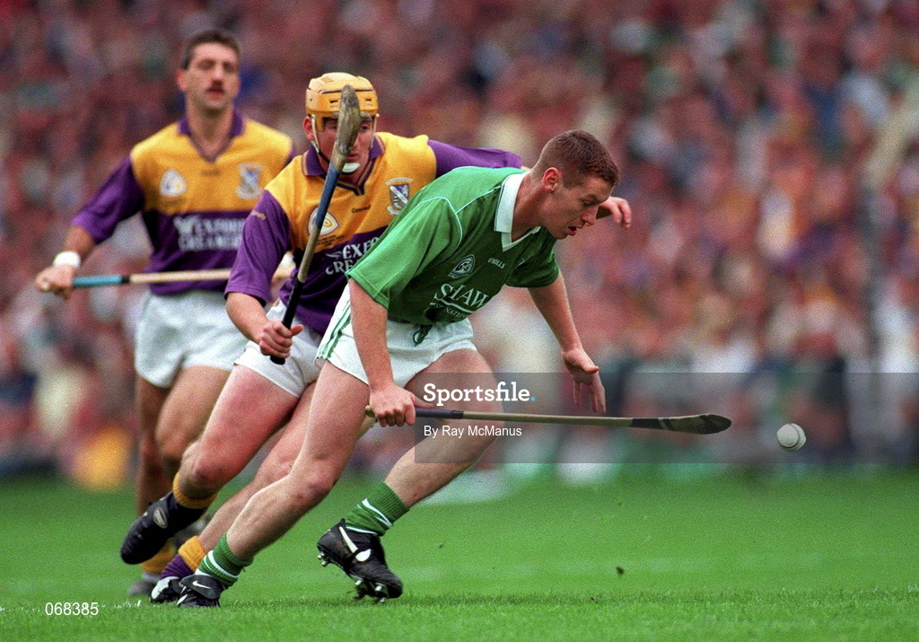 1 September 1996; Ciaran Carey of Limerick in action against Gary Laffan of Wexford during the Guinness All-Ireland Senior Hurling Championship Final match between Wexford and Limerick at Croke Park in Dublin. Photo by Ray McManus/Sportsfile