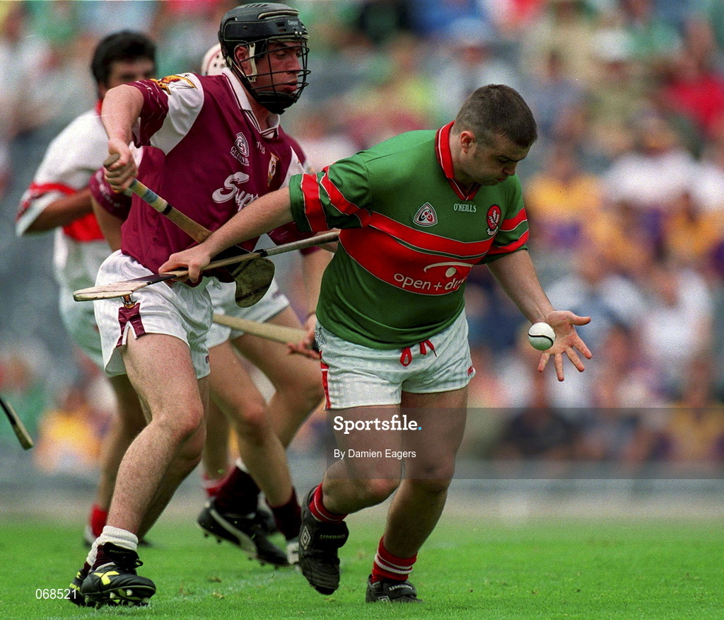 29 July 2001; Kieran Stevenson of Derry is tackled by Alan Kerins of Galway during the Guinness All-Ireland Senior hurling Championship Quarter-Final match between Galway and Derry at Croke Park in Dublin. Photo by Damien Eagers/Sportsfile