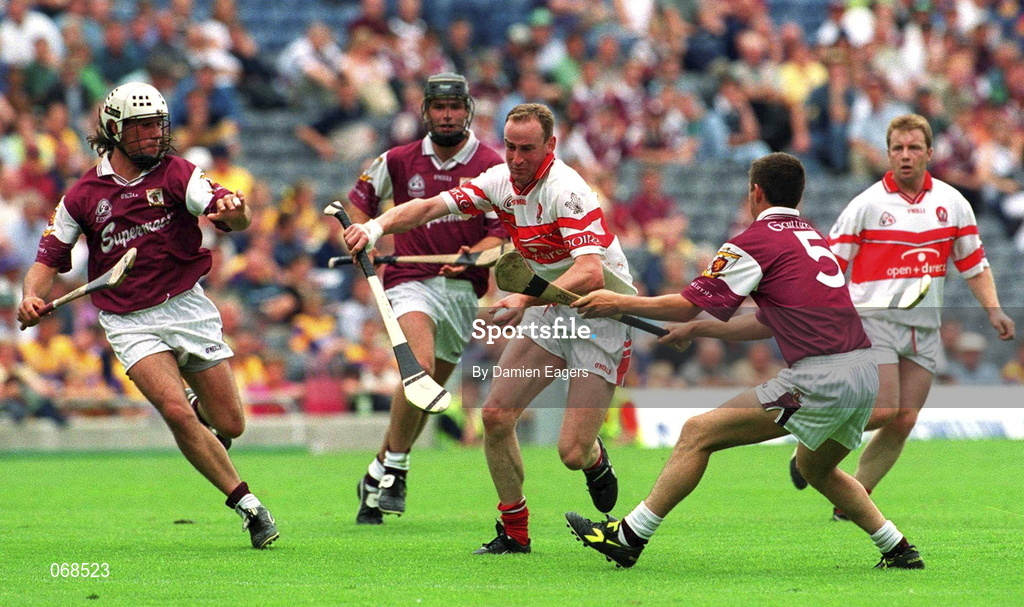 29 July 2001; Oliver Collins of Derry in action against David Tierney, left, and Derek Hardiman of Galway during the Guinness All-Ireland Senior hurling Championship Quarter-Final match between Galway and Derry at Croke Park in Dublin. Photo by Damien Eagers/Sportsfile