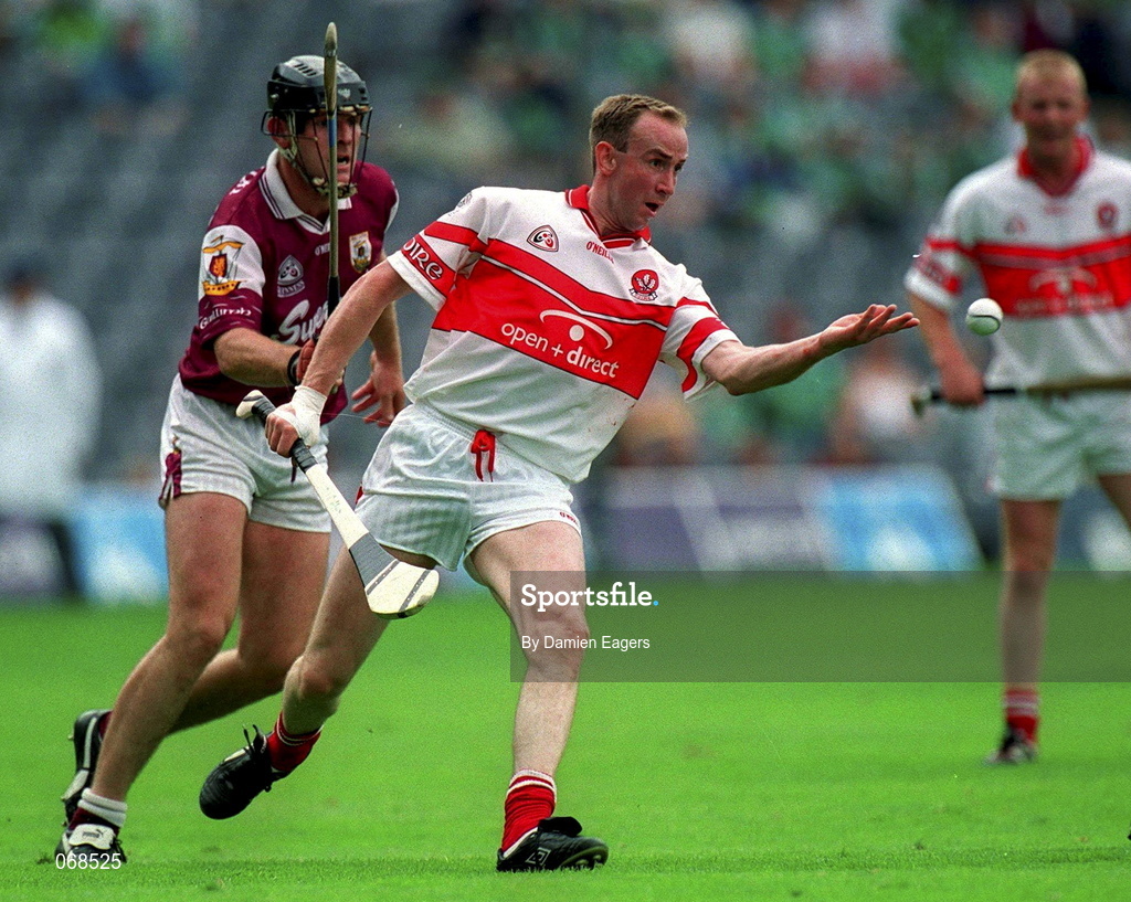 29 July 2001; Oliver Collins of Derry in action against Joe Rabitte of Galway during the Guinness All-Ireland Senior hurling Championship Quarter-Final match between Galway and Derry at Croke Park in Dublin. Photo by Damien Eagers/Sportsfile