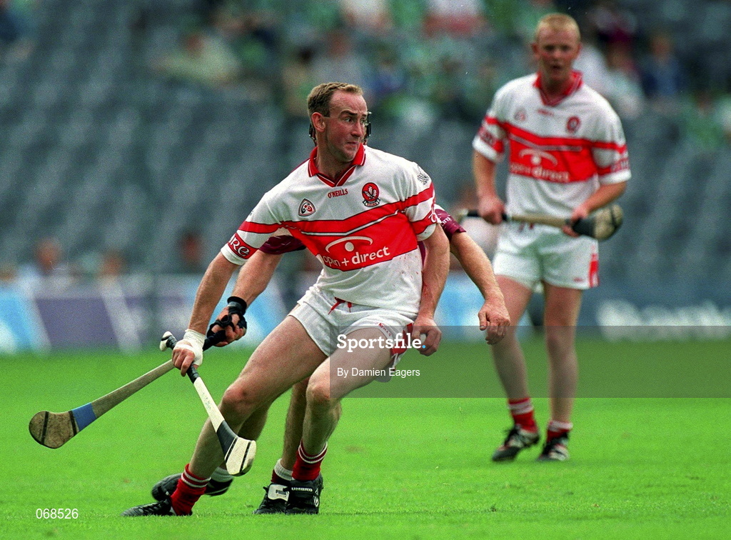29 July 2001; Oliver Collins of Derry in action against Joe Rabitte of Galway during the Guinness All-Ireland Senior hurling Championship Quarter-Final match between Galway and Derry at Croke Park in Dublin. Photo by Damien Eagers/Sportsfile