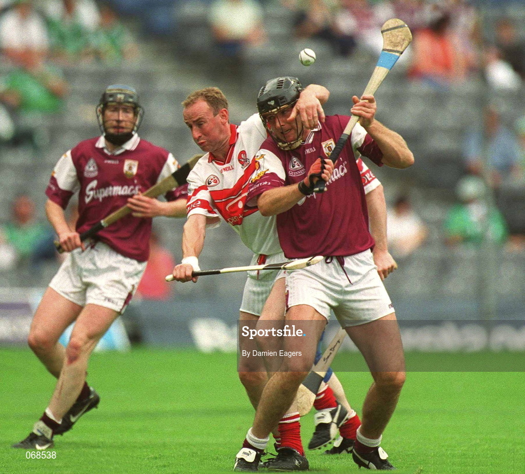 29 July 2001;  Joe Rabbite of Galway in action against Oliver Collins of Derry during the Guinness All-Ireland Senior hurling Championship Quarter-Final match between Galway and Derry at Croke Park in Dublin. Photo by Damien Eagers/Sportsfile