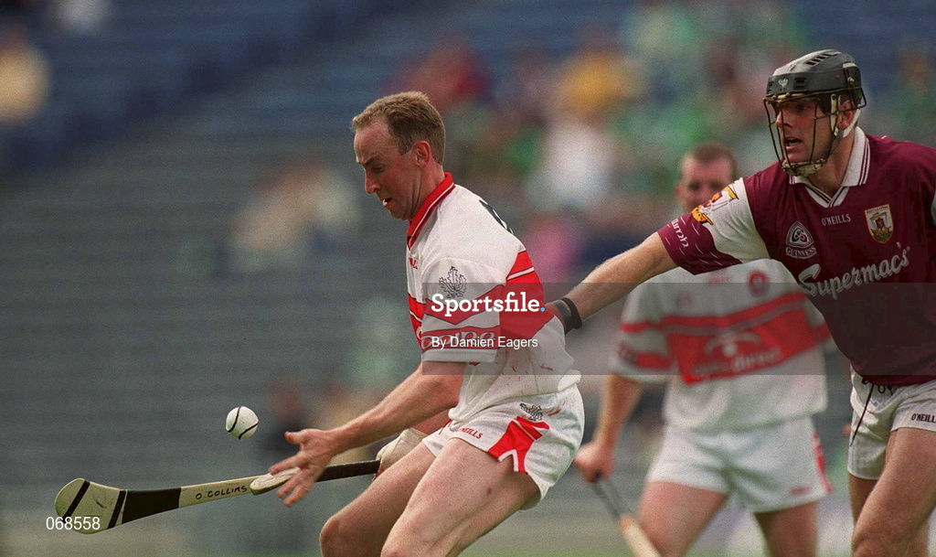 29 July 2001; Oliver Collins of Derry in action against Joe Rabitte of Galway during the Guinness All-Ireland Senior hurling Championship Quarter-Final match between Galway and Derry at Croke Park in Dublin. Photo by Damien Eagers/Sportsfile