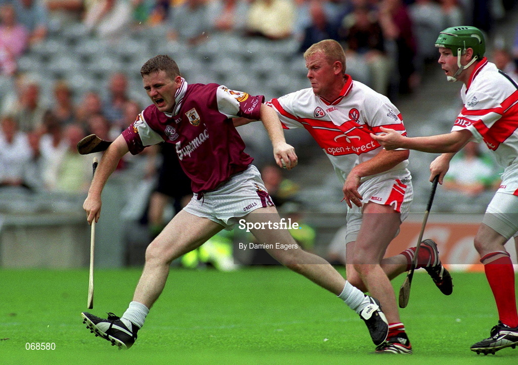 29 July 2001; Gregory Kennedy of Galway is tackled by Gregory Biggs and Michael Collins, right, of Derry during the Guinness All-Ireland Senior hurling Championship Quarter-Final match between Galway and Derry at Croke Park in Dublin. Photo by Damien Eagers/Sportsfile