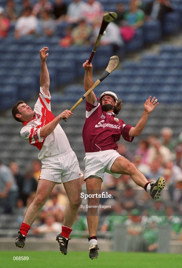 29 July 2001; David Tierney of Galway contests a dropping ball with Ronan McCloskey of Derry during the Guinness All-Ireland Senior hurling Championship Quarter-Final match between Galway and Derry at Croke Park in Dublin. Photo by Damien Eagers/Sportsfile