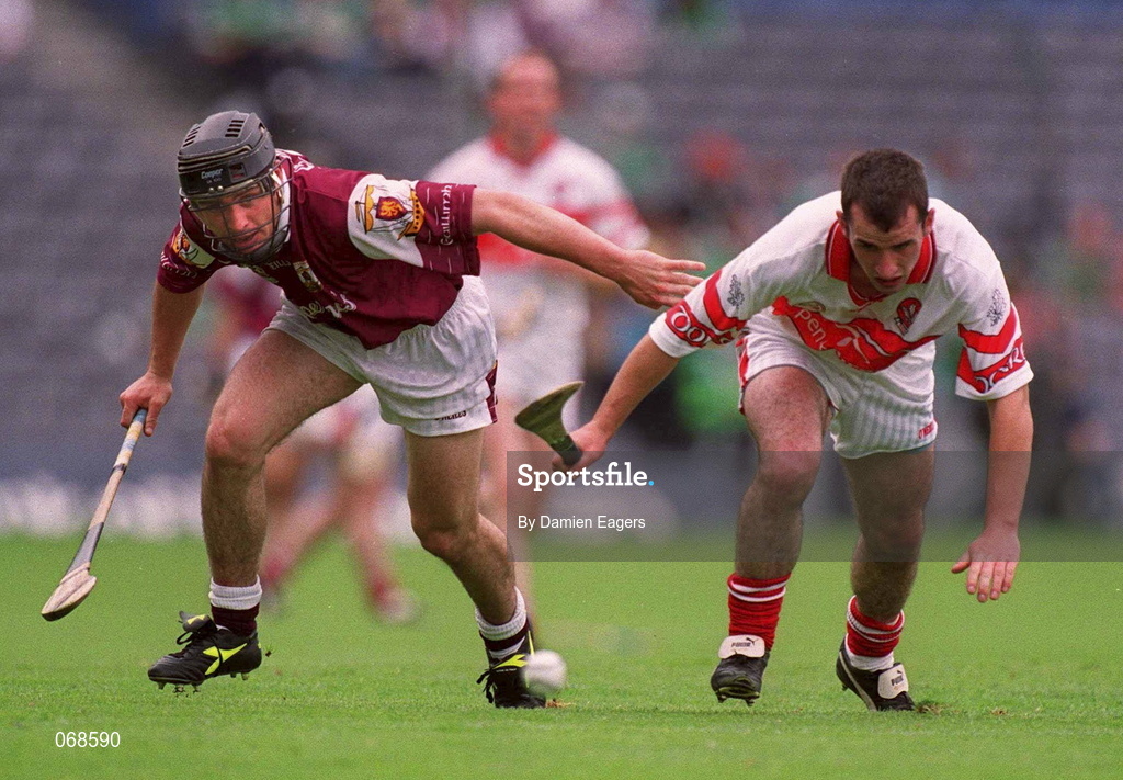 29 July 2001; Alan Kerins of Galway in a race for possession with Padraig Kelly of Derry during the Guinness All-Ireland Senior hurling Championship Quarter-Final match between Galway and Derry at Croke Park in Dublin. Photo by Damien Eagers/Sportsfile