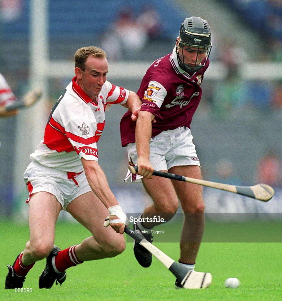 29 July 2001; Oliver Collins of Derry in action against Richie Murray of Derry during the Guinness All-Ireland Senior hurling Championship Quarter-Final match between Galway and Derry at Croke Park in Dublin. Photo by Damien Eagers/Sportsfile