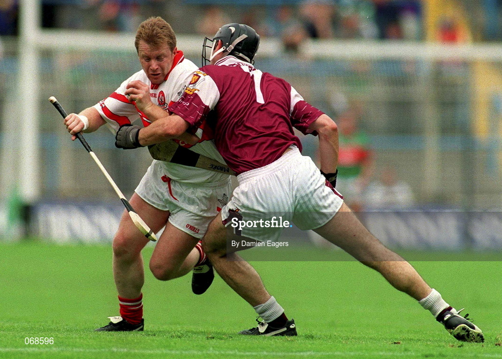 29 July 2001; Kieran McKeever of Derry is tackled by Cathal Moore of Galway during the Guinness All-Ireland Senior hurling Championship Quarter-Final match between Galway and Derry at Croke Park in Dublin. Photo by Damien Eagers/Sportsfile