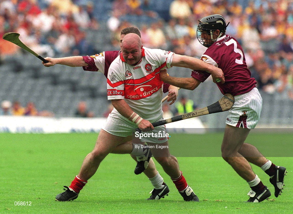 29 July 2001; Geoffrey McGonagle of Derry is tackled by Michael Healy, right, and Gregory Kennedy of Galway during the Guinness All-Ireland Senior hurling Championship Quarter-Final match between Galway and Derry at Croke Park in Dublin. Photo by Damien Eagers/Sportsfile