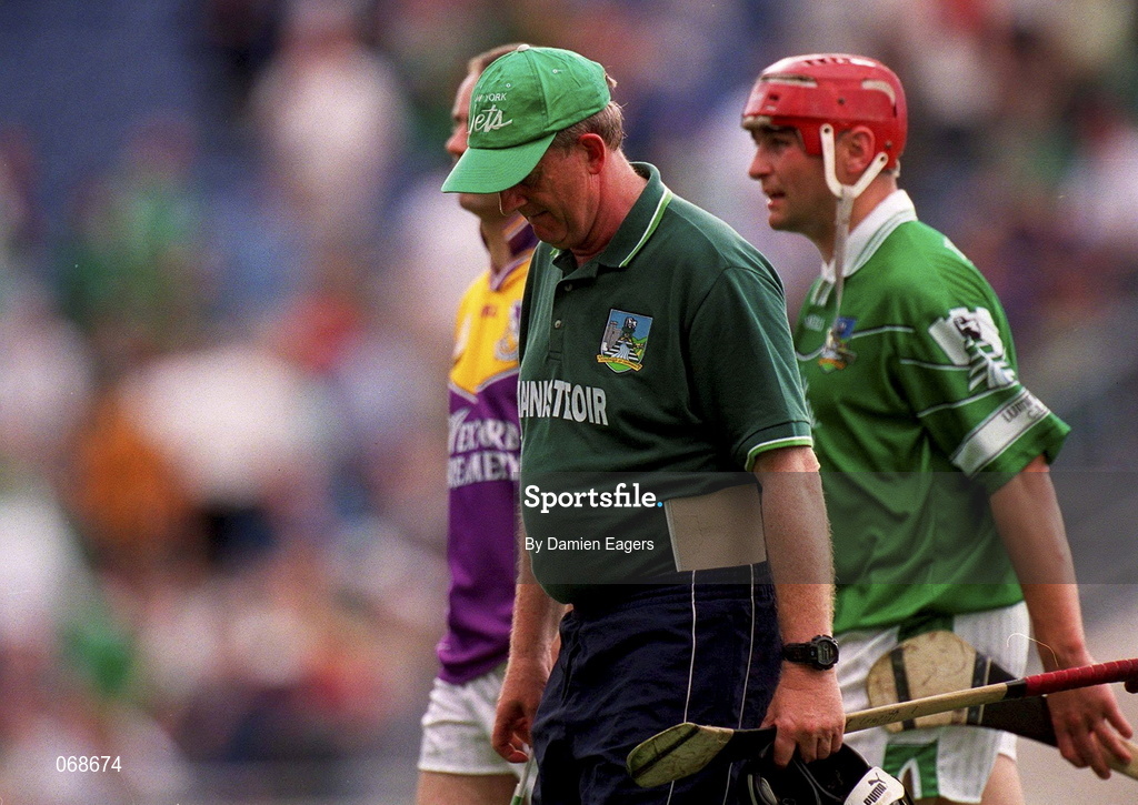 29 July 2001; Limerick Manager Eamonn Cregan walks off the pitch during the Guinness All-Ireland Senior Hurling Championship Quarter-Final match between Wexford and Limerick at Croke Park in Dublin. Photo by Damien Eagers/Sportsfile