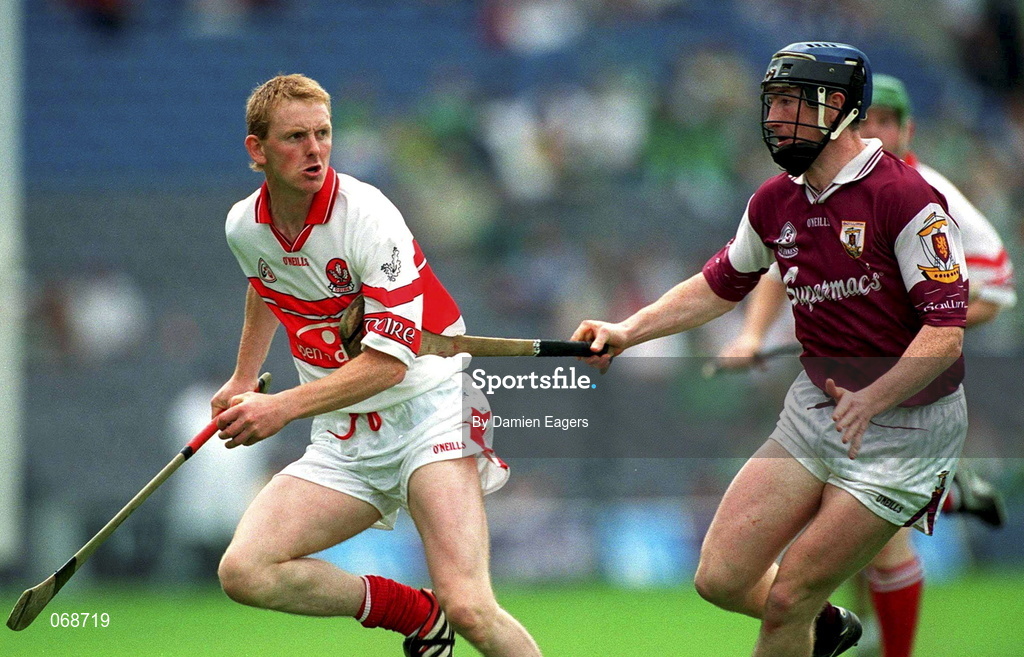 29 July 2001; Gregory Biggs of Derry in action against Liam Hodgins of Galway during the Guinness All-Ireland Senior hurling Championship Quarter-Final match between Galway and Derry at Croke Park in Dublin. Photo by Damien Eagers/Sportsfile