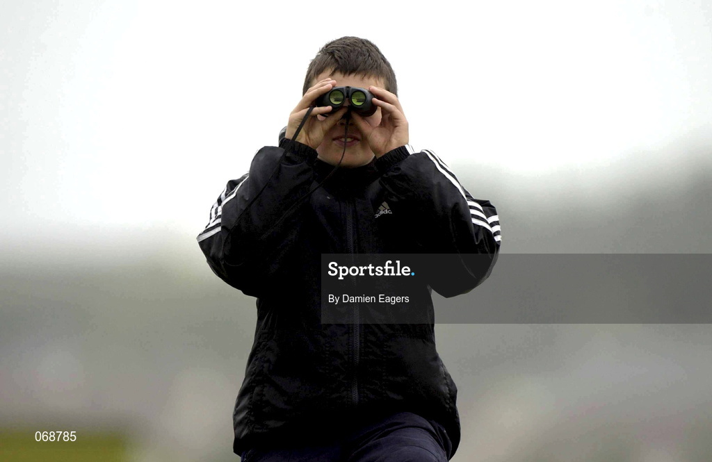 30 July 2001; A young racegoer during day 1 of the Galway Summer Racing Festival at Ballybrit Racecourse in Galway. Photo by Damien Eagers/Sportsfile