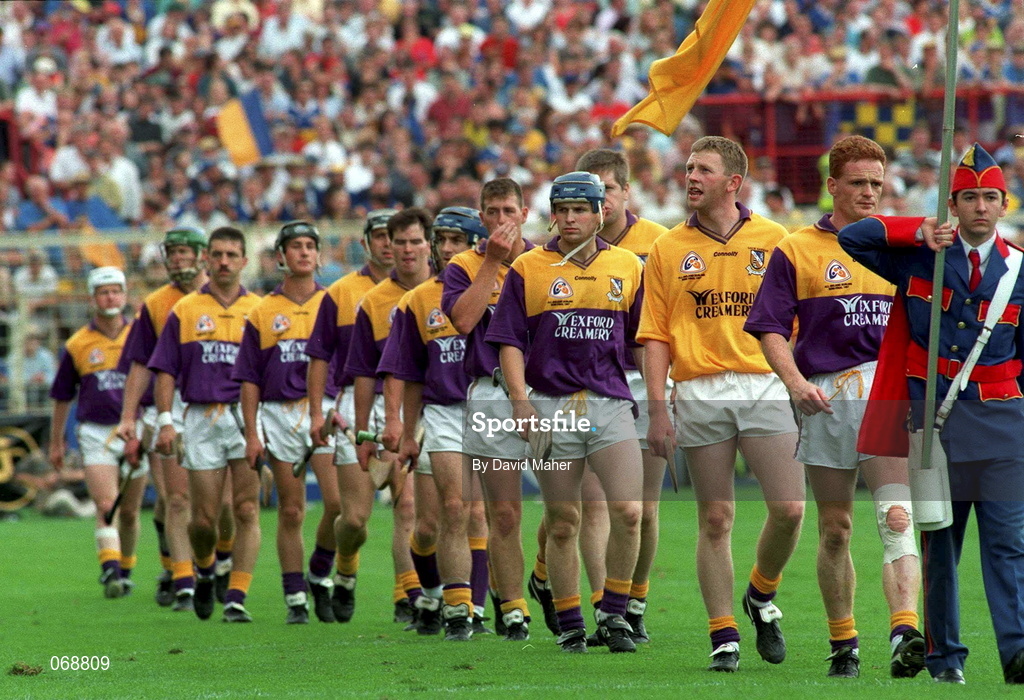 17 August 1997; The Wexford Hurling team are led by team captain Rod Guiney in the pre-match parade prior to the Guinness All-Ireland Senior Hurling Championship Semi-Final match between Tipperary and Wexford at Croke Park in Dublin. Photo by David Maher/Sportsfile