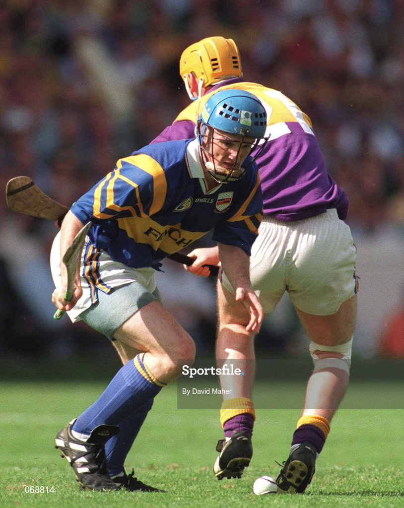 17 August 1997; Noel Sheehy of Tipperary in action against Garry Laffan of Wexford during the Guinness All-Ireland Senior Hurling Championship Semi-Final match between Tipperary and Wexford at Croke Park in Dublin. Photo by David Maher/Sportsfile