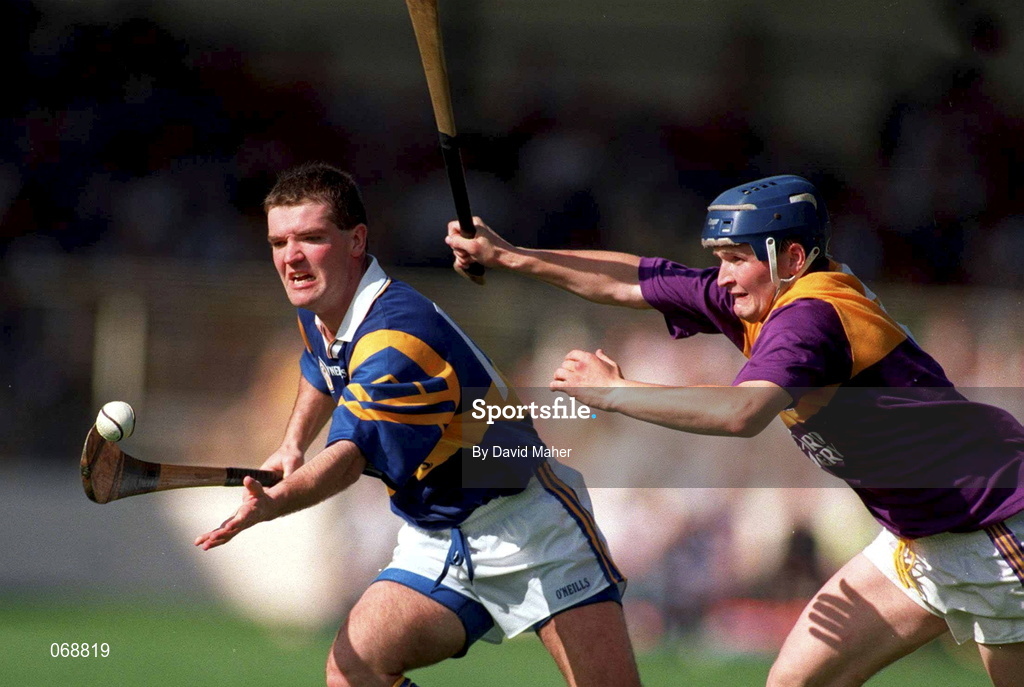 17 August 1997; Michael Cleary if Tipperary in action against Colm Kehoe of Wexford during the Guinness All-Ireland Senior Hurling Championship Semi-Final match between Tipperary and Wexford at Croke Park in Dublin. Photo by David Maher/Sportsfile