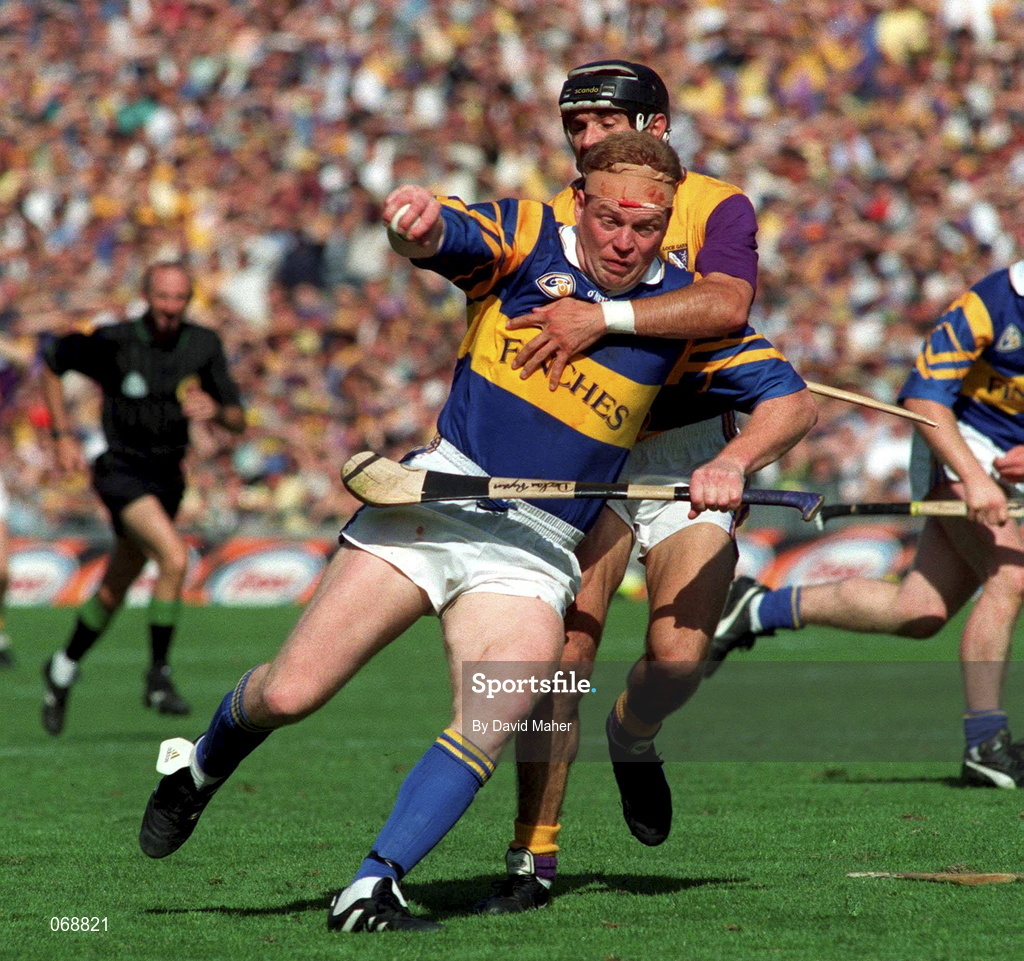 17 August 1997; Declan Ryan of Tipperary is tackled by John O'Connor of Wexford during the Guinness All-Ireland Senior Hurling Championship Semi-Final match between Tipperary and Wexford at Croke Park in Dublin. Photo by David Maher/Sportsfile