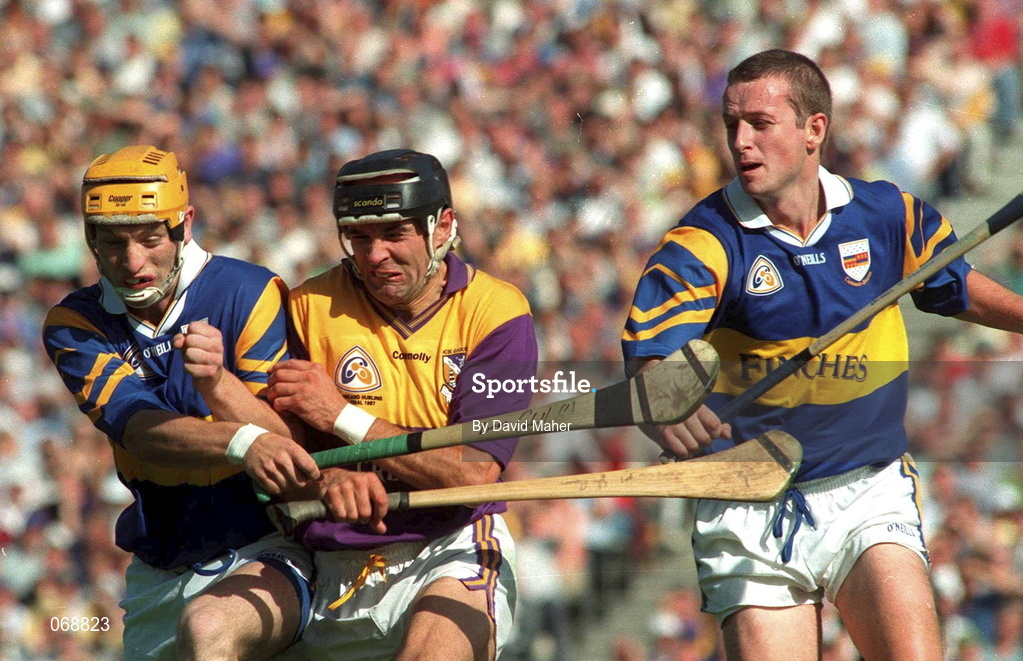 17 August 1997; John O'Connor of Wexford in action against Liam Cahill, left, and Brian O'Meara of Tipperary during the Guinness All-Ireland Senior Hurling Championship Semi-Final match between Tipperary and Wexford at Croke Park in Dublin. Photo by David Maher/Sportsfile