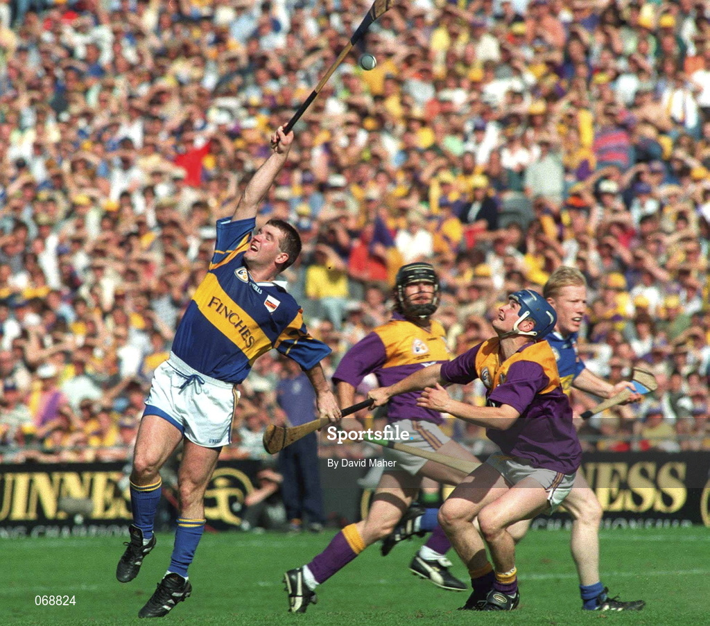 17 August 1997; Michael Cleary of Tipperary contests a high ball with Colm Kehoe of Wexford during the Guinness All-Ireland Senior Hurling Championship Semi-Final match between Tipperary and Wexford at Croke Park in Dublin. Photo by David Maher/Sportsfile