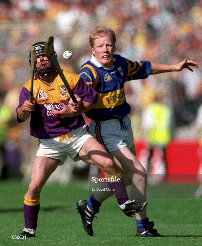 17 August 1997; Sean Flood of Wexford in action against Aidan Ryan of Tipperary during the Guinness All-Ireland Senior Hurling Championship Semi-Final match between Tipperary and Wexford at Croke Park in Dublin. Photo by David Maher/Sportsfile