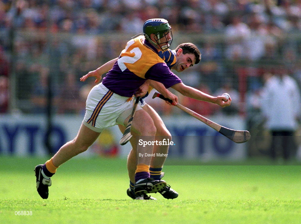 17 August 1997;  Larry Murphy of Wexford in action against Liam Sheedy of Tipperary during the Guinness All-Ireland Senior Hurling Championship Semi-Final match between Tipperary and Wexford at Croke Park in Dublin. Photo by David Maher/Sportsfile