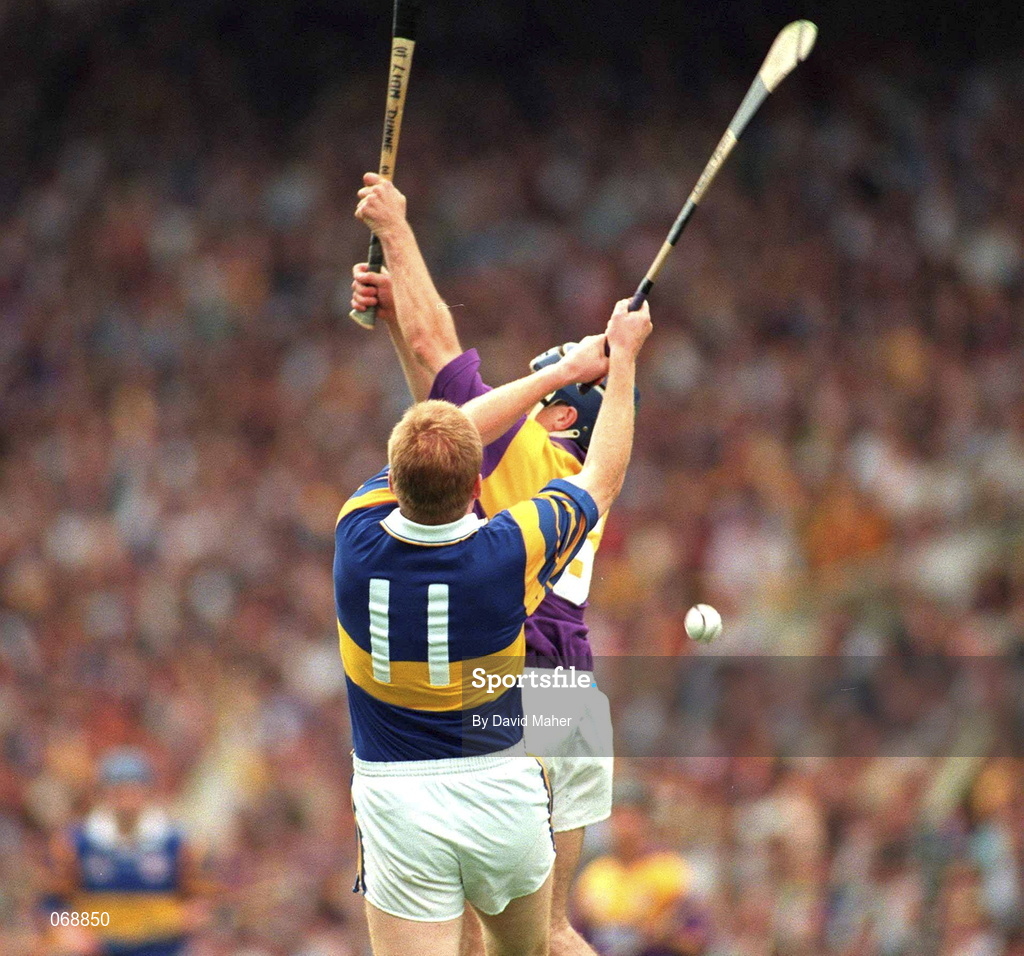 17 August 1997; Declan Ryan of Tipperary contests a high ball with Liam Dunne of Wexford during the Guinness All-Ireland Senior Hurling Championship Semi-Final match between Tipperary and Wexford at Croke Park in Dublin. Photo by David Maher/Sportsfile