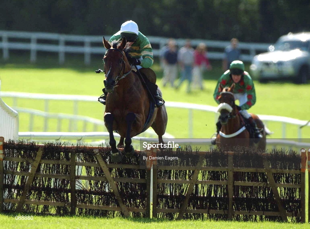 31 July 2001; Get it On, with Charlie Swan up, clears the last, to go on and win the Albatros Feeds Maiden Hurdle of £10,000 during day 2 of the Galway Summer Racing Festival at Ballybrit Racecourse in Galway. Photo by Damien Eagers/Sportsfile