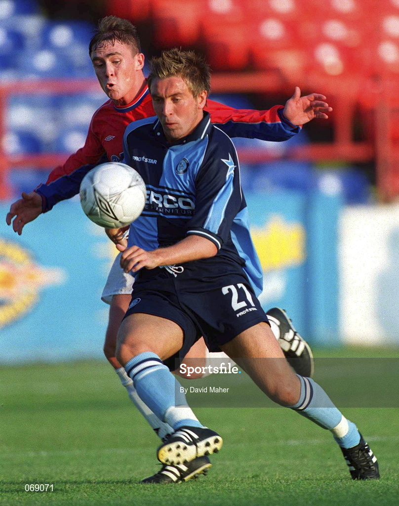 27 July 2001; Danny Currie of Wycombe Wanderers in action against Richie Baker of Shelbourne during the pre-season friendly match between Shelbourne and Wycombe Wanderers at Tolka Park in Dublin. Photo by David Maher/Sportsfile