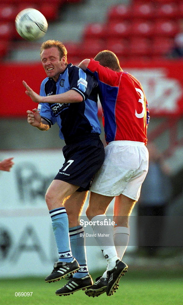 27 July 2001; Dave Carroll of Wycombe Wanderers in action against Jonathan Minnock of Shelbourne during the pre-season friendly match between Shelbourne and Wycombe Wanderers at Tolka Park in Dublin. Photo by David Maher/Sportsfile