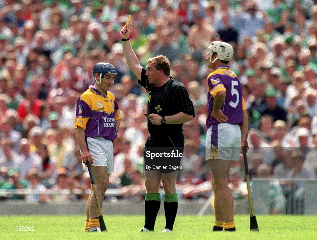 29 July 2001; Liam Dunne of Wexford is shown the yellow card by referee Michael Wadding during the Guinness All-Ireland Senior Hurling Championship Quarter-Final match between Wexford and Limerick at Croke Park in Dublin. Photo by Damien Eagers/Sportsfile